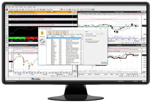 MetaStock price charts and an analysis window on a desktop monitor