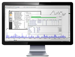 MetaStock chart with volume and a data window on a monitor